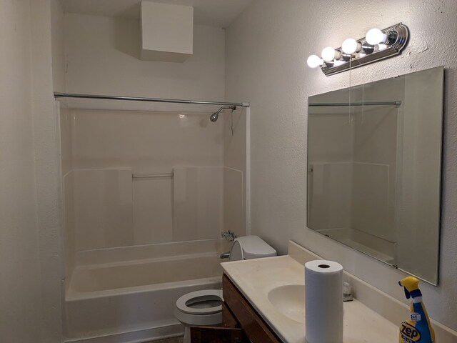 full bathroom with vanity, bathtub / shower combination, and toilet