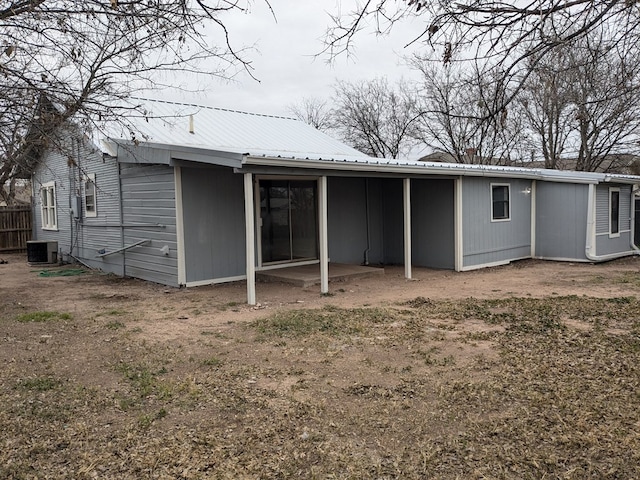 back of house with cooling unit