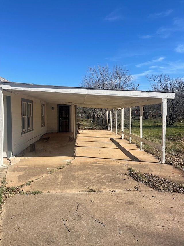 view of front of property with a carport