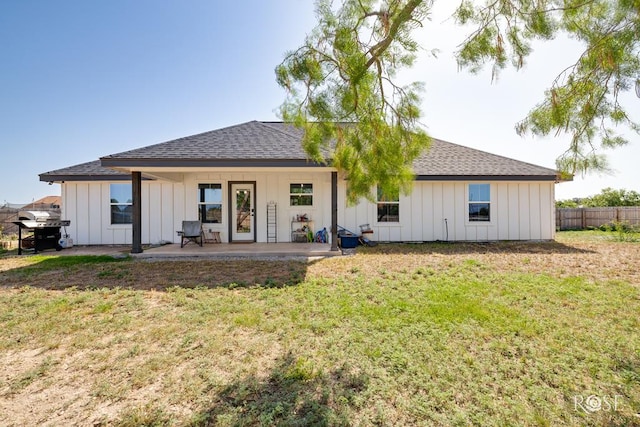 2846 Ricks Dr, San Angelo, TX 76905 - back of property with board and batten siding and roof with shingles