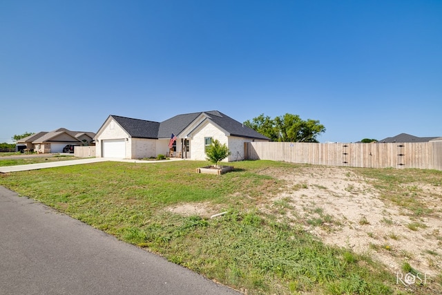 2846 Ricks Dr, San Angelo, TX 76905 - view of front of property featuring driveway and a garage