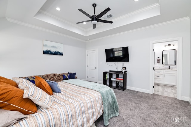 2846 Ricks Dr, San Angelo, TX 76905 - bedroom with a raised ceiling, carpet flooring, ornamental molding, recessed lighting, and connected bathroom