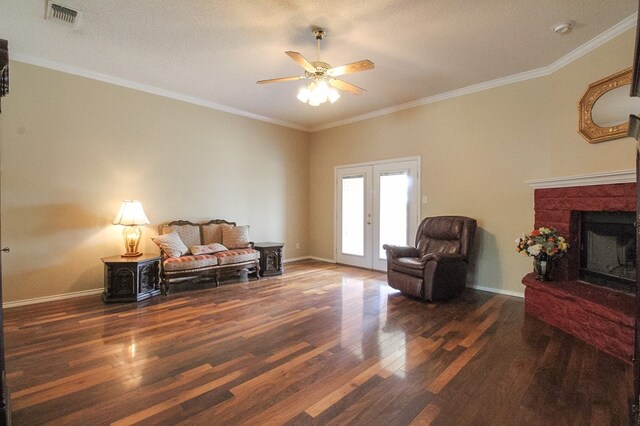 5905 Stratford Ave, San Angelo, TX 76901 - sitting room featuring visible vents, crown molding, wood finished floors, french doors, and a ceiling fan