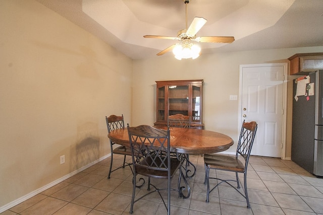 5905 Stratford Ave, San Angelo, TX 76901 - dining area featuring baseboards, a ceiling fan, and light tile patterned floors