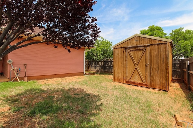5905 Stratford Ave, San Angelo, TX 76901 - exterior space with an outbuilding, a fenced backyard, and a shed