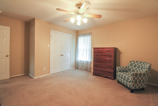5905 Stratford Ave, San Angelo, TX 76901 - sitting room with carpet flooring, a ceiling fan, and baseboards