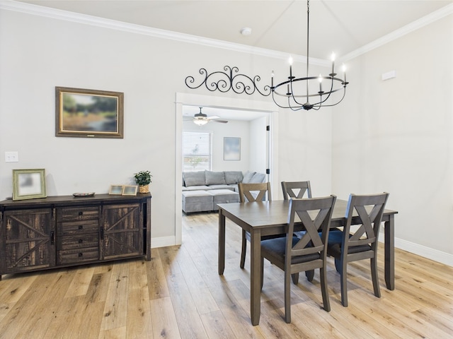 8353 Chad Rd, San Angelo, TX 76957 - dining space featuring baseboards, wood finished floors, ornamental molding, and a chandelier