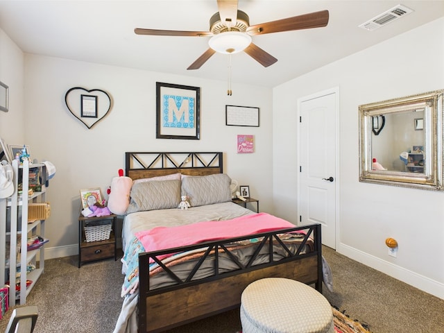 8353 Chad Rd, San Angelo, TX 76957 - bedroom with carpet, baseboards, and a ceiling fan