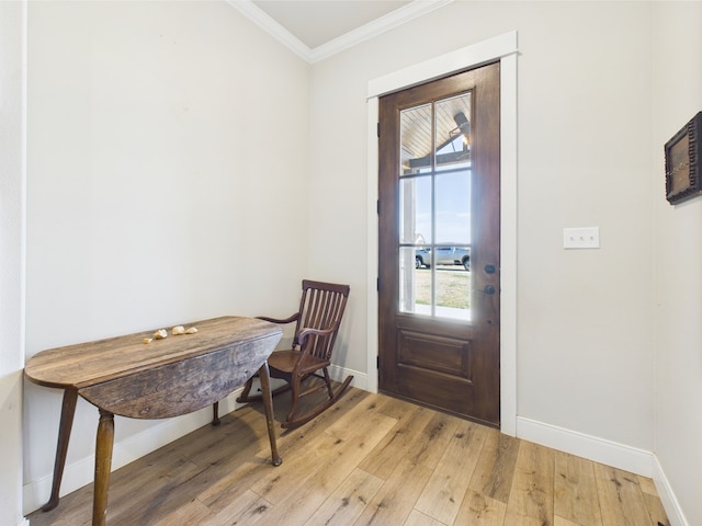 8353 Chad Rd, San Angelo, TX 76957 - foyer featuring crown molding, baseboards, and light wood-style flooring