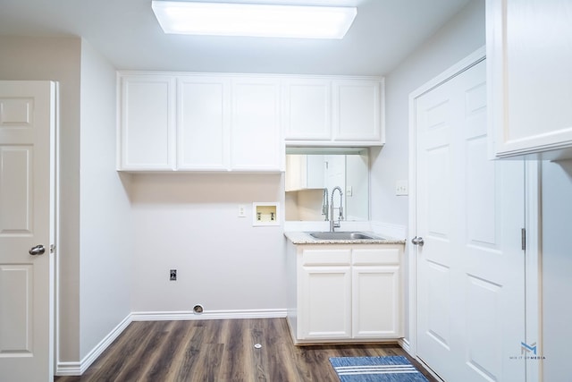 laundry room with sink, cabinets, washer hookup, dark wood-type flooring, and hookup for an electric dryer