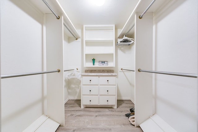 spacious closet with light wood-type flooring