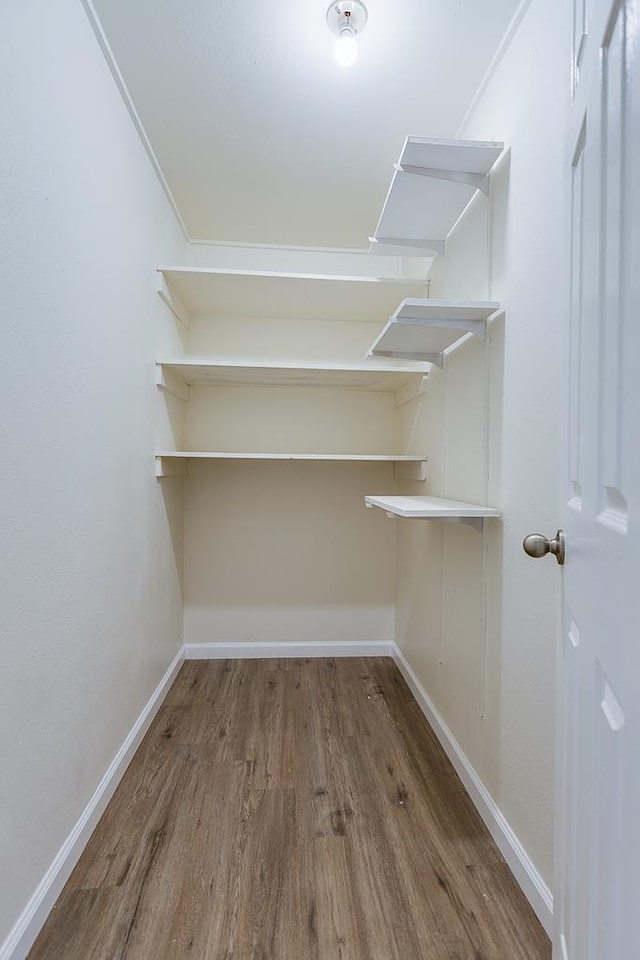 326 River Oaks St, San Angelo, TX 76903 - spacious closet with wood finished floors
