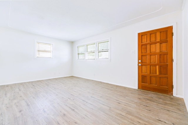326 River Oaks St, San Angelo, TX 76903 - empty room featuring light wood-type flooring and baseboards