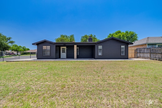 1702 Parkview Dr, San Angelo, TX 76904 - view of front of property with a chimney and a patio area