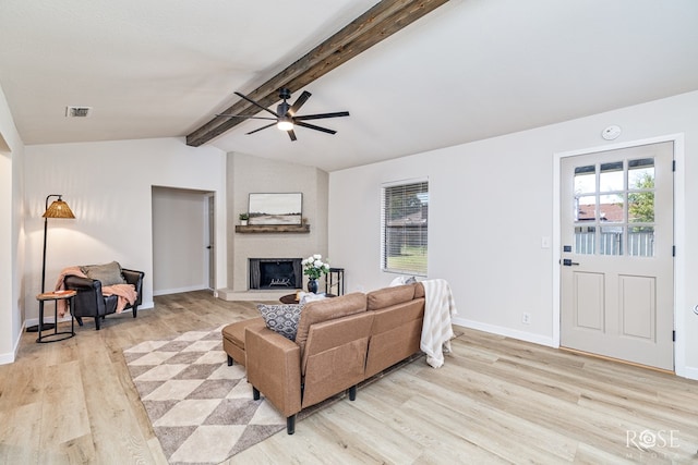 1702 Parkview Dr, San Angelo, TX 76904 - living area featuring light wood-type flooring, ceiling fan, a large fireplace, and baseboards
