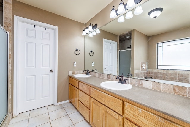 bathroom with tile patterned flooring, vanity, and independent shower and bath