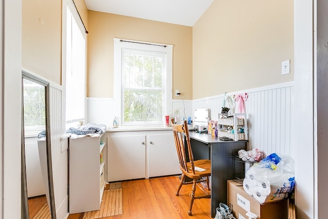 laundry room featuring light wood-type flooring