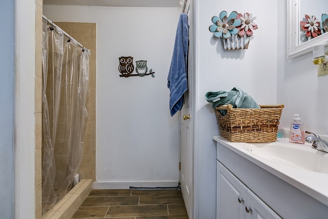 bathroom featuring vanity and walk in shower