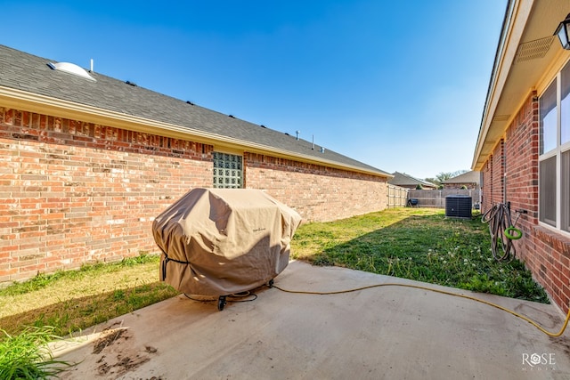 view of patio / terrace featuring grilling area and central air condition unit