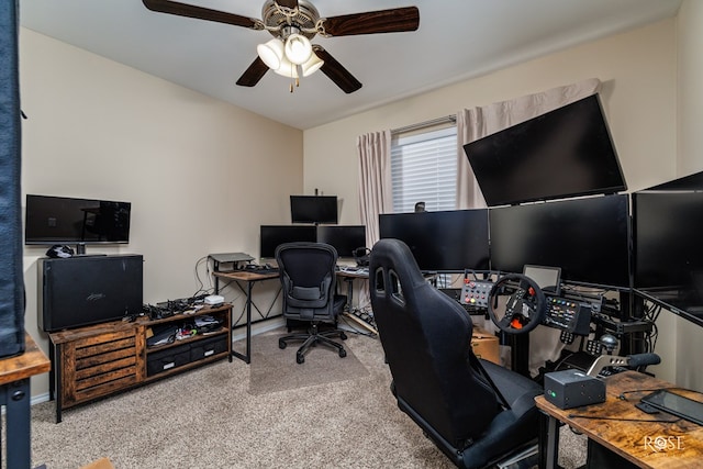 office area with carpet and ceiling fan