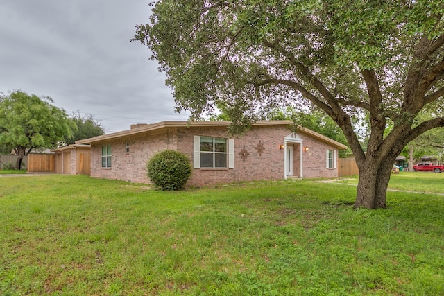 2526 Harvard Ave, San Angelo, TX 76904 - view of home's exterior featuring an attached garage and brick siding