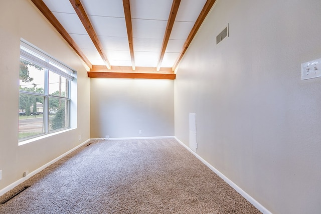 2526 Harvard Ave, San Angelo, TX 76904 - carpeted spare room featuring beam ceiling and baseboards
