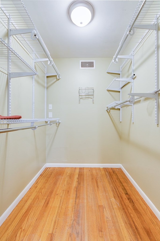2526 Harvard Ave, San Angelo, TX 76904 - spacious closet featuring wood finished floors