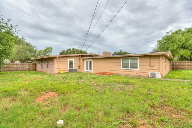 2526 Harvard Ave, San Angelo, TX 76904 - back of property with a chimney and central AC unit