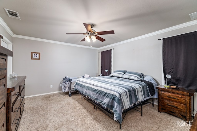 bedroom featuring visible vents, crown molding, ceiling fan, baseboards, and light carpet