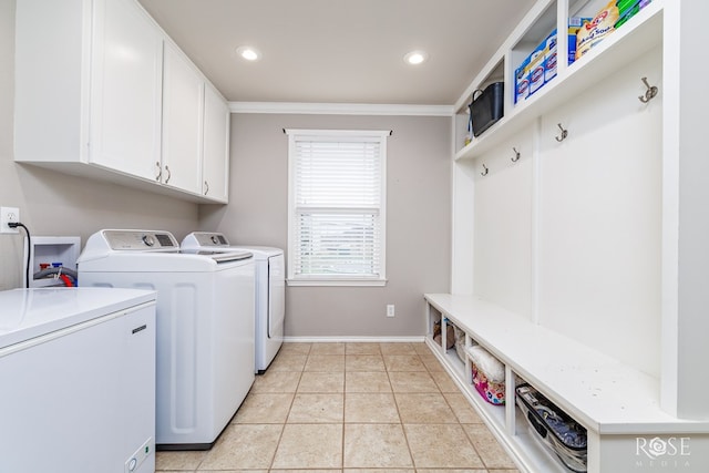 washroom with light tile patterned floors, baseboards, recessed lighting, cabinet space, and independent washer and dryer