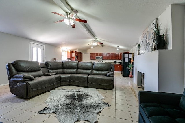 2458 Fishermans Rd, San Angelo, TX 76904 - living room featuring ceiling fan, light tile patterned flooring, and a fireplace with raised hearth