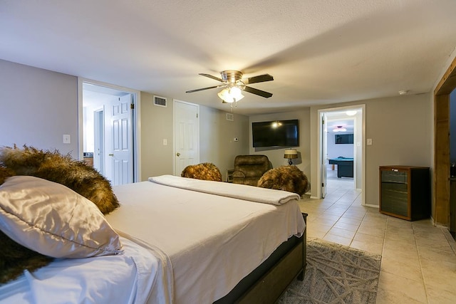 2458 Fishermans Rd, San Angelo, TX 76904 - bedroom featuring light tile patterned flooring and a ceiling fan