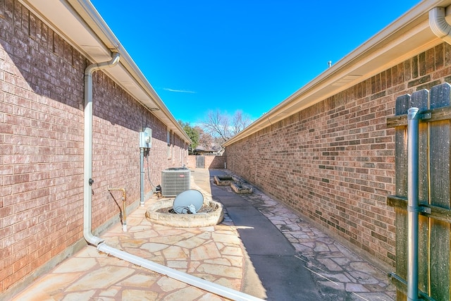 view of patio / terrace featuring cooling unit