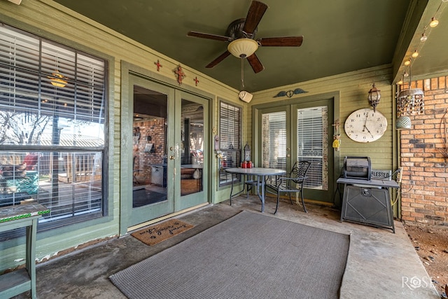 view of patio / terrace with ceiling fan and french doors