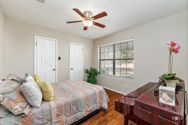 4917 Bermuda Dr, San Angelo, TX 76904 - bedroom with wood finished floors, baseboards, and a ceiling fan