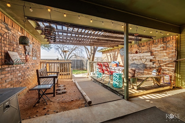 view of patio / terrace featuring fence and a pergola