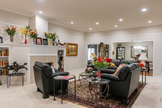 5213 Green Valley Trl, San Angelo, TX 76904 - living room featuring recessed lighting, crown molding, a chandelier, and a fireplace
