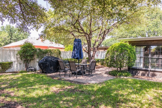 5213 Green Valley Trl, San Angelo, TX 76904 - fenced backyard with a patio area
