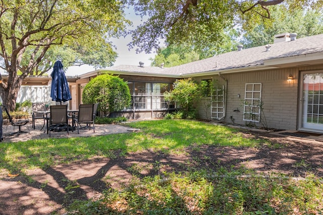 5213 Green Valley Trl, San Angelo, TX 76904 - view of grassy yard featuring a patio area