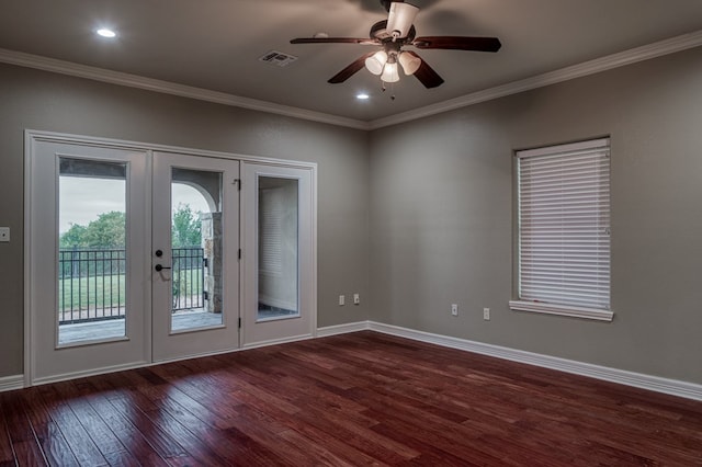 entryway featuring crown molding, dark hardwood / wood-style floors, a healthy amount of sunlight, and french doors