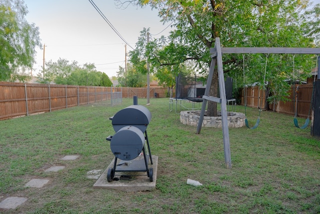 417 E 47th St, San Angelo, TX 76903 - fenced backyard featuring a trampoline