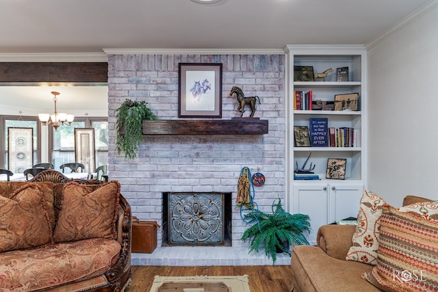 201 Hudspeth St, Sonora, TX 76950 - living area with wood finished floors, an inviting chandelier, a fireplace, and crown molding