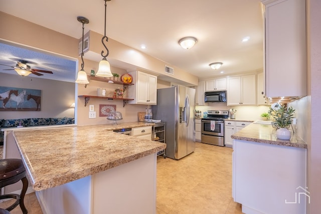 kitchen with a peninsula, open shelves, white cabinets, and stainless steel appliances