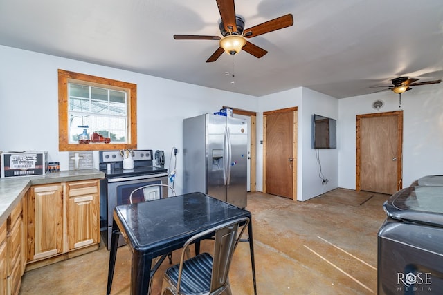 kitchen with ceiling fan and appliances with stainless steel finishes