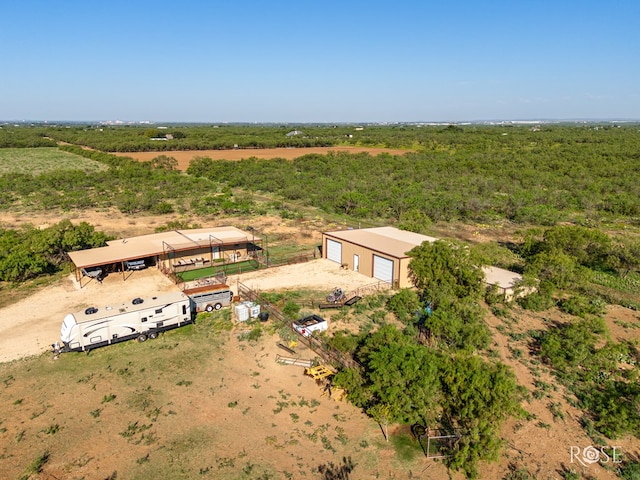 birds eye view of property featuring a rural view