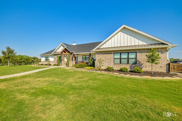 view of front of home with a front yard