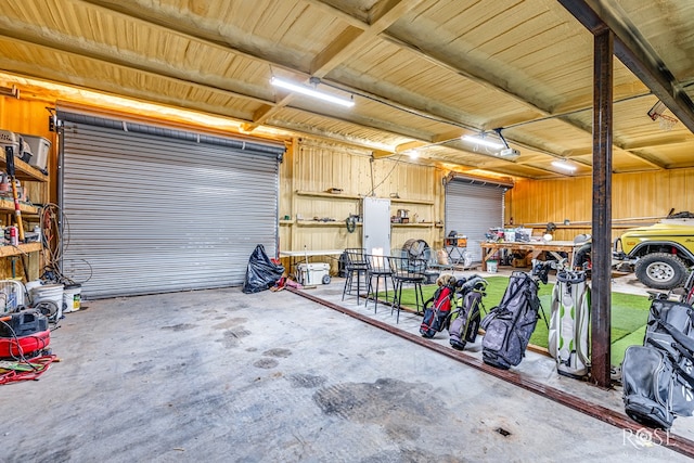 garage with a workshop area