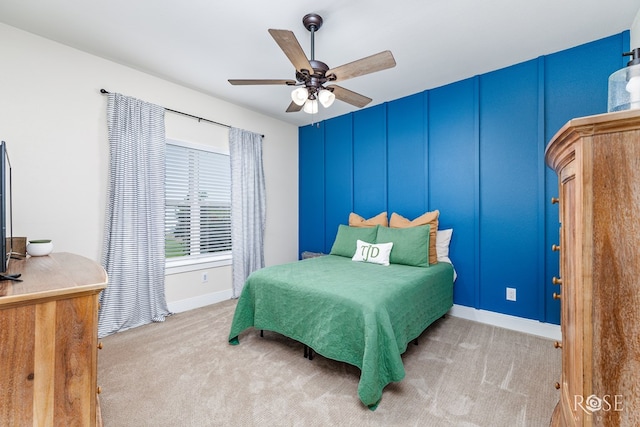 carpeted bedroom with ceiling fan