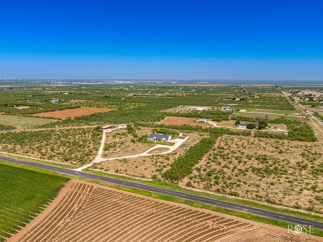 birds eye view of property featuring a rural view