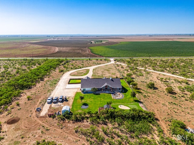 birds eye view of property featuring a rural view